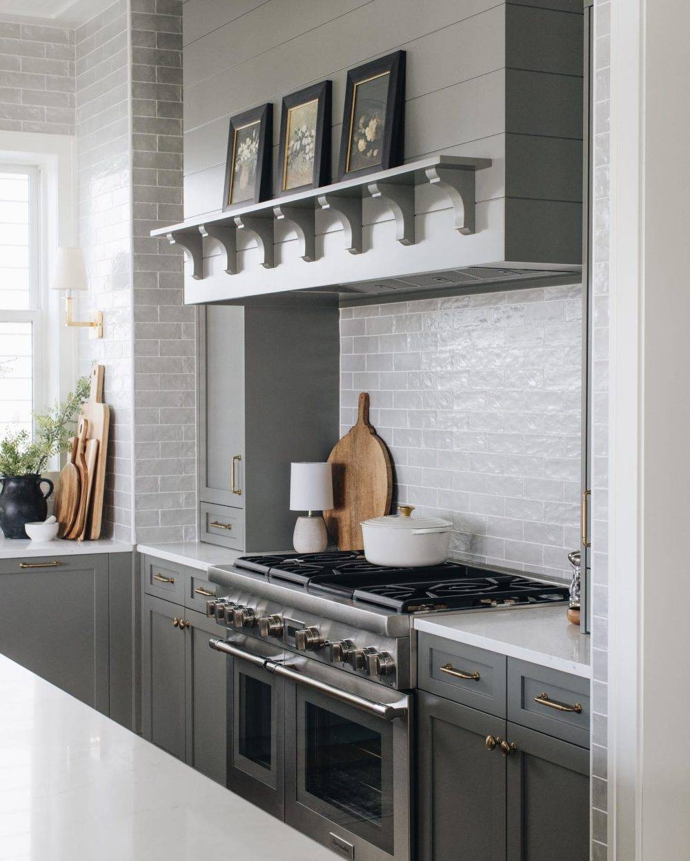 elegant neutral kitchen with pearlescent grey tiled backsplash