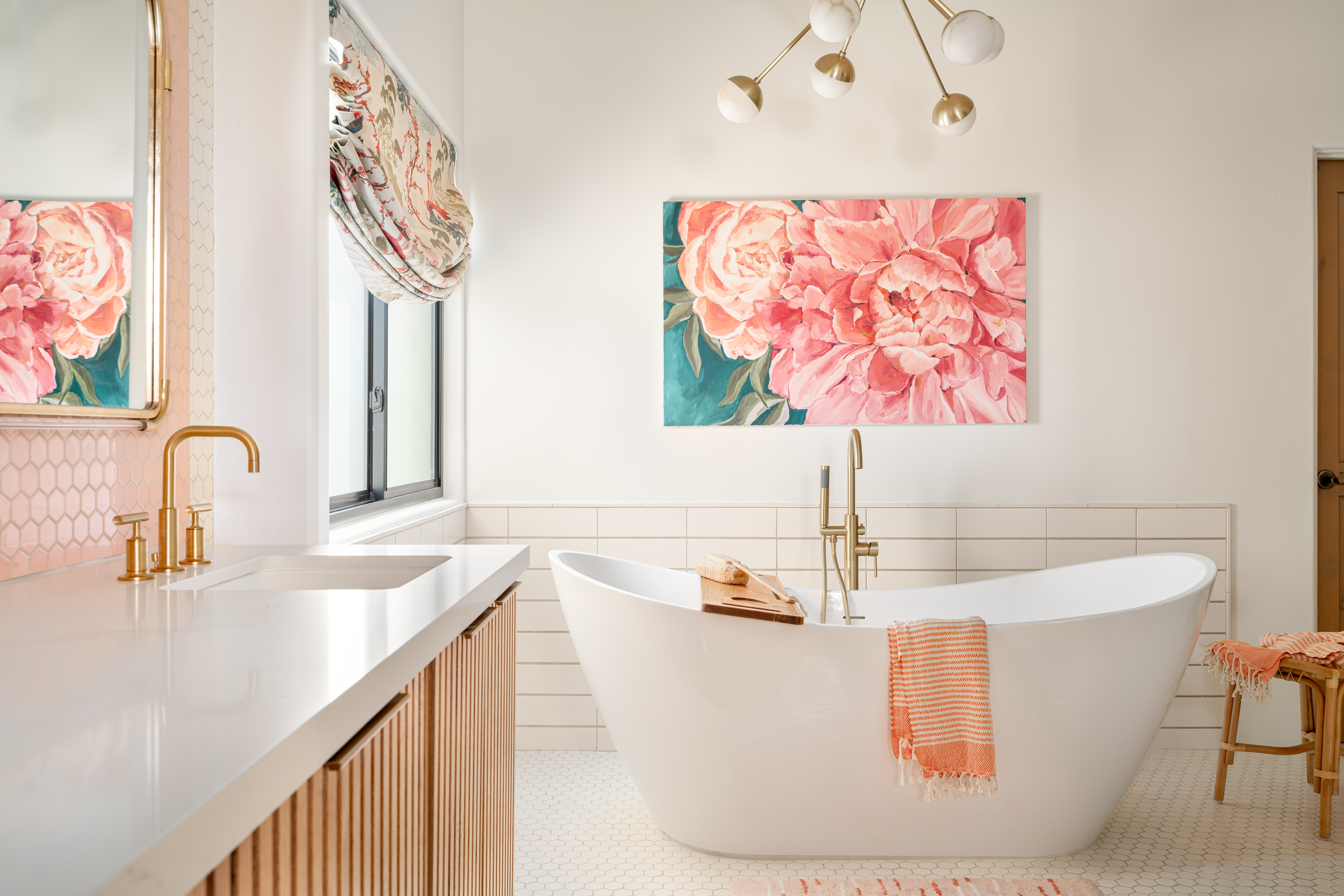 Art deco bathroom with white subway tile and large floral painting