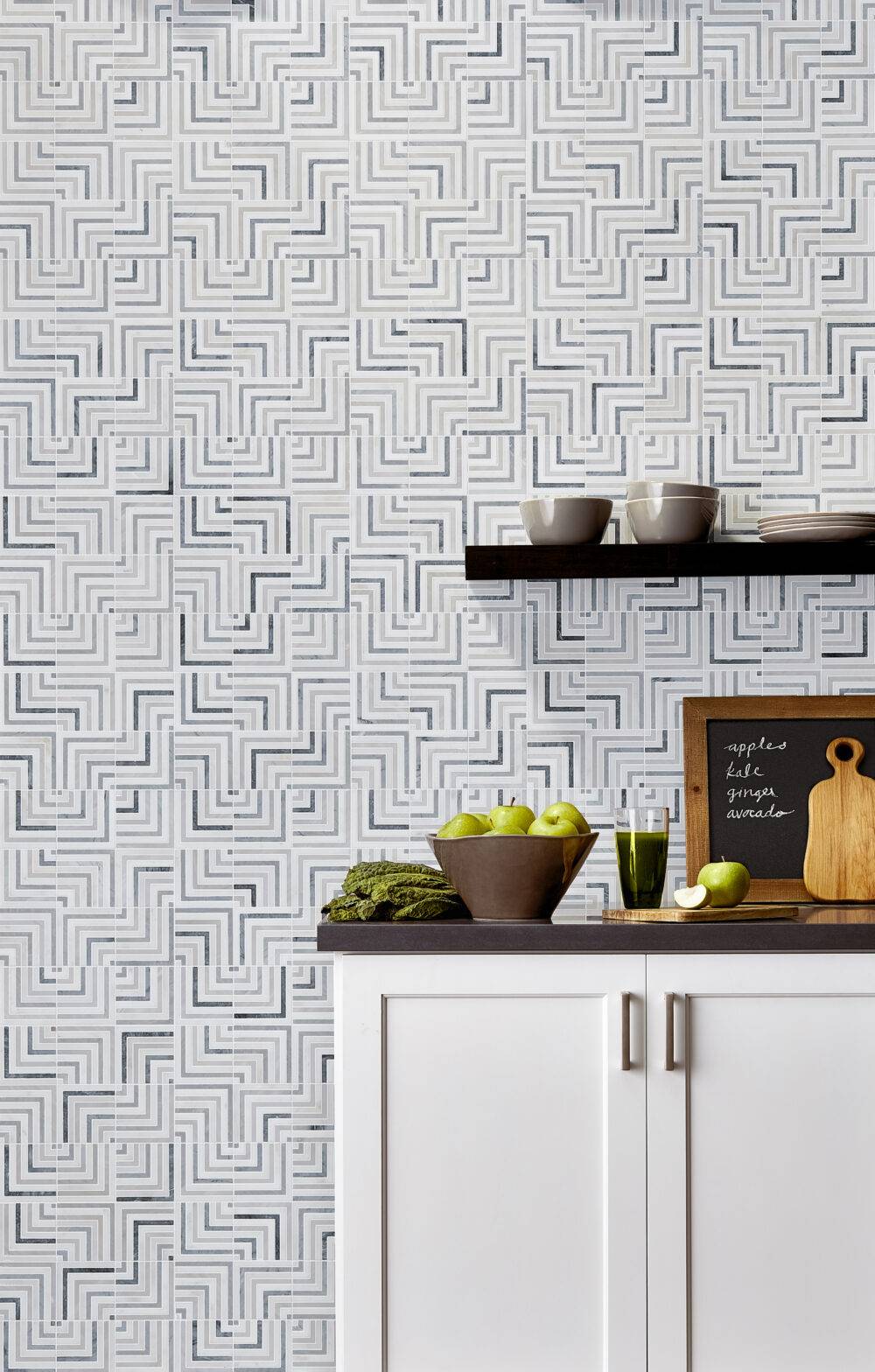 White 3-D contemporary wall tile on kitchen backsplash.