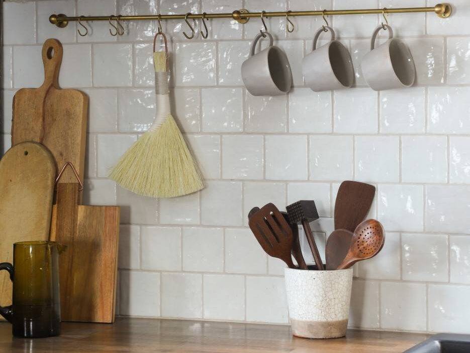 White handmade-look tile backsplash in a Modern Farmhouse style kitchen. 