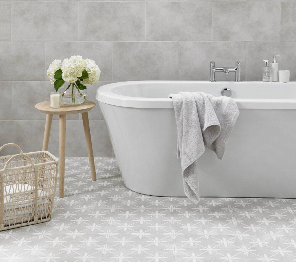This bathroom features a  13" x 13" Wicker Dove Grey matte porcelain tile features an intricate and unique geometric pattern in soft, dove-grey hues. 