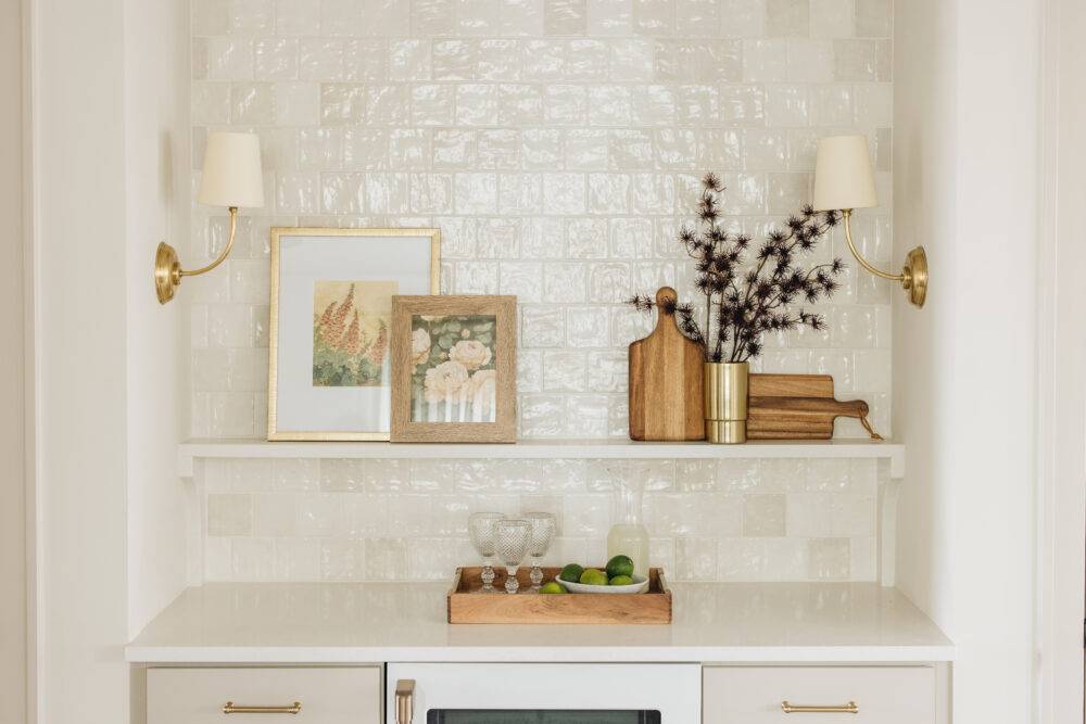 The wall of this butler's pantry features white square handmade-look tile in durable ceramic with a glossy finish.