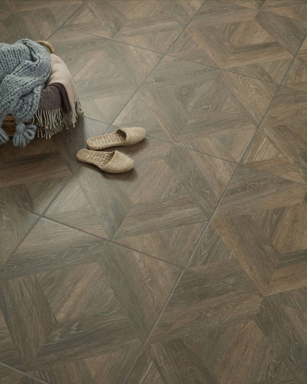 A wood-look diamond patterned floor tile.